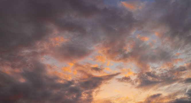 Clouds and sky backdrop at sunrise and sunset,Colorful sky with clouds at sunset or sunrise in a blurred background.