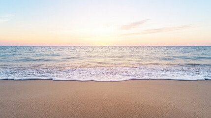 Obraz premium Serene beach scene with gentle waves lapping at shore during sunset