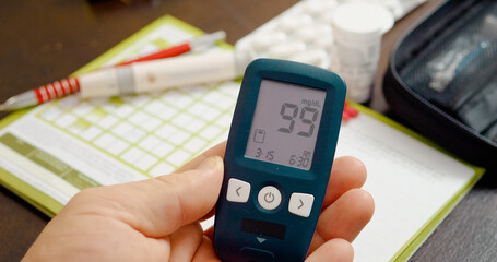 A blood sugar test shows a result of 99, placing it at the borderline of normal and prediabetes, highlighting the importance of monitoring glucose levels regularly.