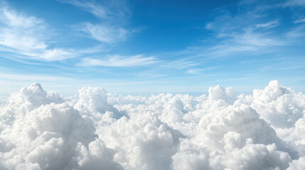 Fluffy white clouds fill sky, creating serene and cinematic atmosphere
