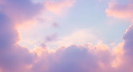 Fototapeta premium Soft pastel clouds illuminated by golden hour light
