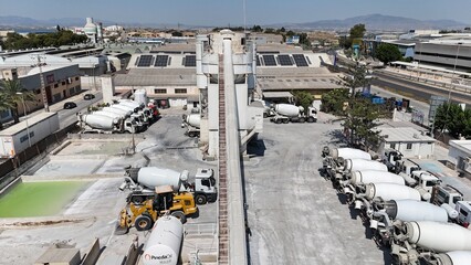 Aerial drone view of industrial cement plant and construction materials factory