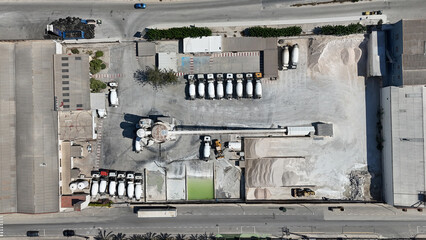 Aerial drone view of industrial cement plant and construction materials factory