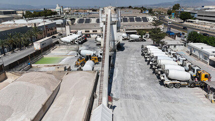 Aerial drone view of industrial cement plant and construction materials factory