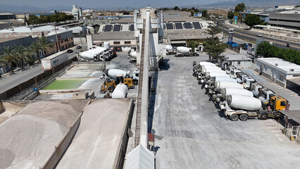 Aerial drone view of industrial cement plant and construction materials factory