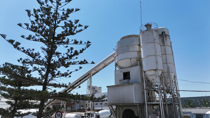 Aerial drone view of industrial cement plant and construction materials factory