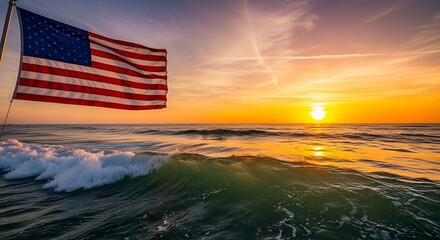 American flag waving over ocean waves at sunset usa flag