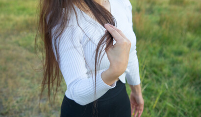 Caucasian young girl showing hair.