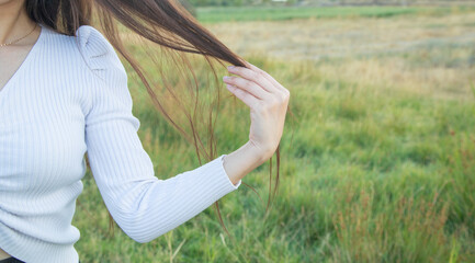 Caucasian young girl showing hair.