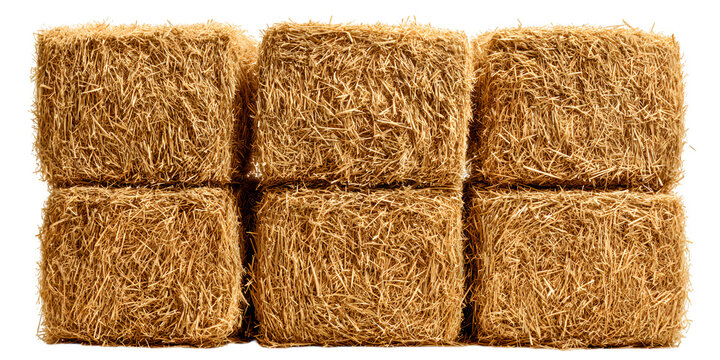Stacked hay bales in a grid pattern