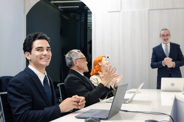 Group of diverse businesspeople at conference. Cheerful officer exchange ideas and listen to...