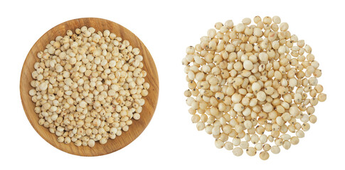 Sorghum seeds in wooden bowl isolated on white background. Top view. Flat lay.