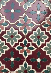 Floral tile pattern with geometric shapes and earthy tones creating a vibrant design