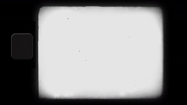 Vintage Film Reel Frame For Retro Content Placement And Display. Black and white film frame with perforations and aging effects. 4x3 center area for vintage video content.
