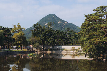 Gyeongbokgung Palace, Seoul, Jongno District, South Korea, in a spring sunny day, exterior view of main Korean royal palace with Bugaksan mountain in the background, museum and palace