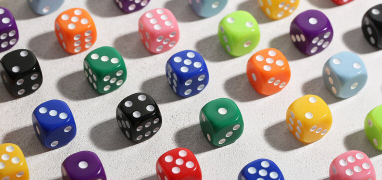 Many game dices on light background