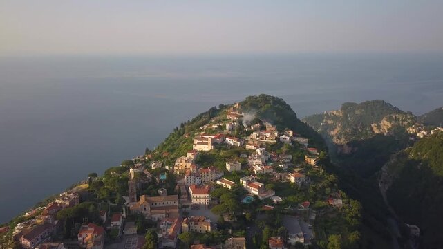 Aerial view of Ravello nestled on the cliffs of the Amalfi Coast at sunset