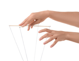Female hands of puppeteer with strings on white background