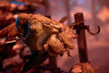 Fototapeta premium Nairobi, Kenya - October 18th 2025 - Giant meat Barbecue, whole chicken beef grill