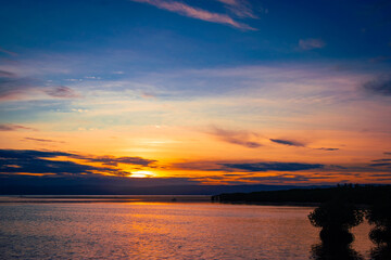 August 23, 2025. Bohol, Philippines. Sunset over the mangrove forest.