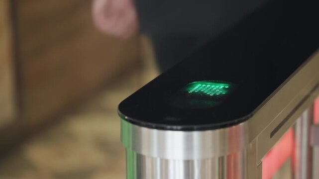 Individual using smartphone to access secure entry system, demonstrating modern technology with sleek design and illuminated interface, showcasing convenience and innovation	