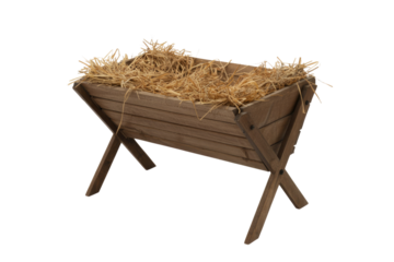 A rustic wooden manger filled with golden straw, symbolizing the birth of Jesus and traditional Christmas nativity scenes. background removed