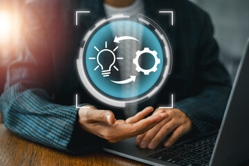 Visual representation of the implementation process featuring gear and lightbulb icons, symbolizing innovation and execution.