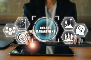 Visual representation of change management with digital icons and a professional using a tablet,...
