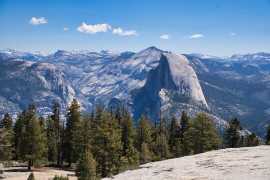  View from Sentinel Dome in Yosemite National Park, California, overlooking Half Dome. Wonderful nature and mountain scenery in the Sierra Nevada region. Travel in the USA. High quality photo