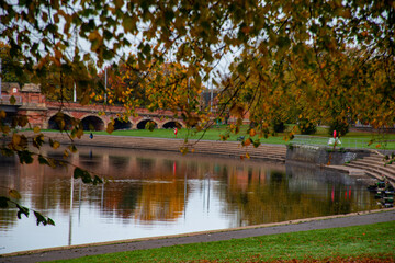 Fototapeta premium Autumn trees in the park along the river Trent in Nottingham, UK.