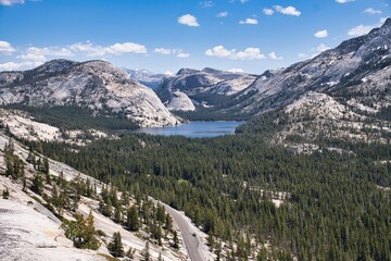 Yosemite National Park. Beautiful scenery with mountains, cliffs, wild rivers, waterfalls, and lakes. A fantastic outdoor vacation spot. Pure nature. Traveling in the USA. High quality photo