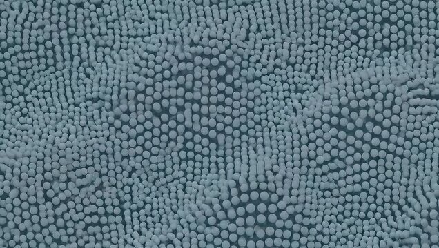 Abstract blue-green textured surface with raised dots and undulating pattern