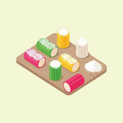 Assortment of colorful traditional kue putu cakes on a wooden board.