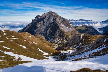 Autumn hike in the Glarus Alps with a view of the M&uuml;rtschenstock. Hiking in the Swiss mountains. Summit destination: the Schwarzst&ouml;ckli above Glarus. High quality photo