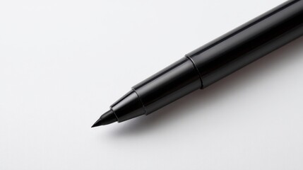 Black marker pen with felt tip point on white background. Office supply or drawing tool for writing and art. Ready for creative design task.