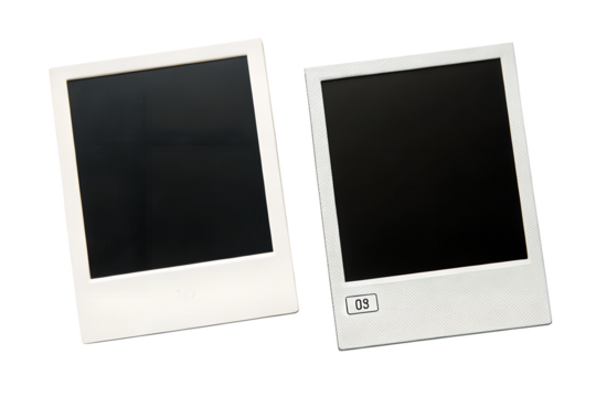 Two blank instant photo frames with white borders and black screens are gently tilted, presented empty and isolated.