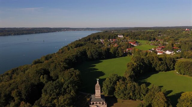 Top view of Bismarck tower Assenhausen Bavaria Germany. Aerial landscape with lake Starnberg, limestone monument, neo roman style architecture and cultural heritage site