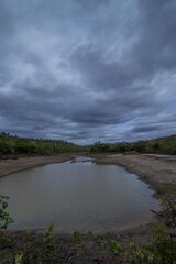Beautiful lagoon with clouds in the sky and the look of rain, located in the city of Turmalina, MG.