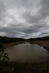 Beautiful lagoon with clouds in the sky and the look of rain, located in the city of Turmalina, MG.