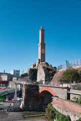 lighthouse of Genoa under blue sky in Italy
