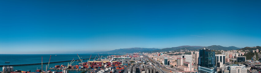 gosses panorama of the harbor in Genoa in Italy with blue sky