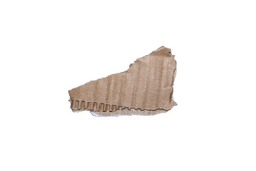 A piece of brown corrugated cardboard cut in an irregular shape, showcasing ridges along the edges. Perfect for crafting, packaging, or as a background element in design.