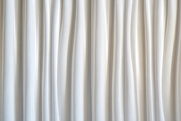 Flying white silk textile fabric flag background. Smooth elegant white Satin Isolated on Background for grand opening ceremony. White curtain.