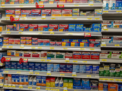 Canada, 11 October 2025 : Pharmacy medicine aisle filled with cold sinus allergy relief products