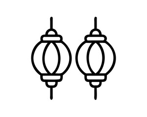 Fototapeta premium Two decorative Chinese lanterns hanging together symbolizing cultural celebration and festive occasions