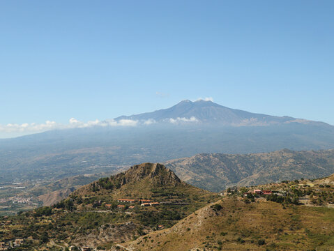 Sicilian rural landscape with Etna volcano  at sunset in Sicily, Italy