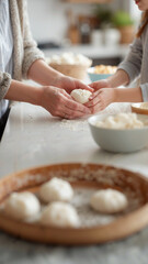 Fototapeta premium a grandmother's wise hands and a granddaughter's small hands making dumplings together in a bright, modern kitchen