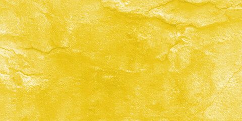 Cracked yellow wall texture background with aged surface and grunge pattern for abstract design or construction concept.