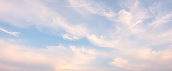 Fototapeta premium Pale sky, wispy clouds, outdoor textured background, elegant, nature