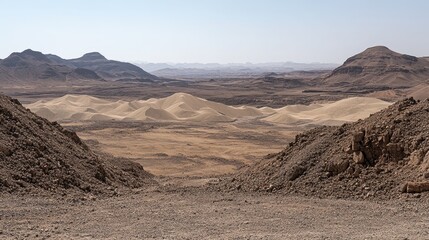 Panoramic desert landscape with sand dunes and distant mountains